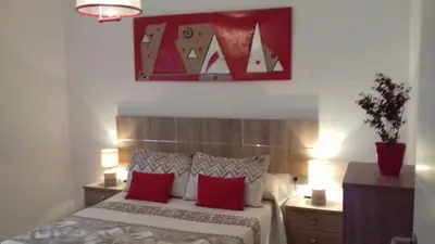 Cama o camas de una habitación en Pompeyos Viviendas Vacacionales