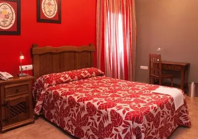 Cama o camas de una habitación en Hotel Rural Miguel Angel