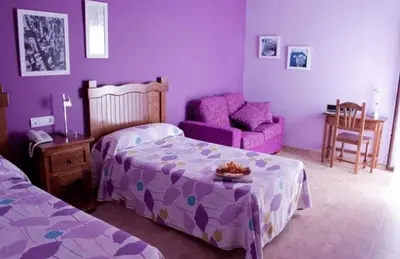 Cama o camas de una habitación en Hotel Rural Miguel Angel