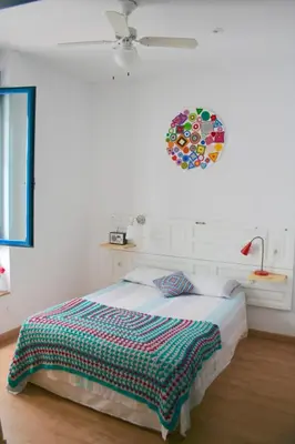 Cama o camas de una habitación en El Taller del Abuelo
