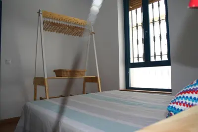 Cama o camas de una habitación en El Taller del Abuelo
