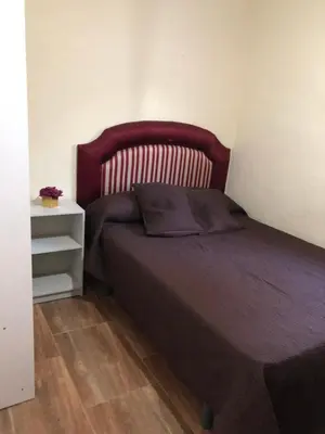 Cama o camas de una habitación en Casa rural en Constantina