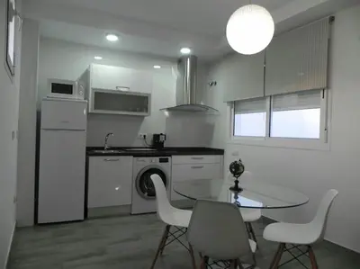 Una cocina o zona de cocina en Atico con terraza en Alameda de Hercules