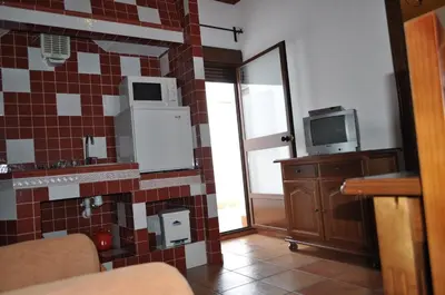 Una cocina o zona de cocina en Apartamentos Rurales Alcazaba de las Torres