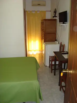 Una televisión o centro de entretenimiento en Hostal Durán