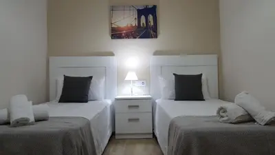 Cama o camas de una habitación en Eduardo Lucena 5, Flamenco