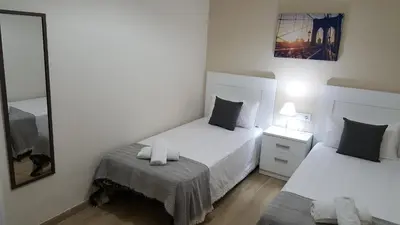 Cama o camas de una habitación en Eduardo Lucena 5, Flamenco