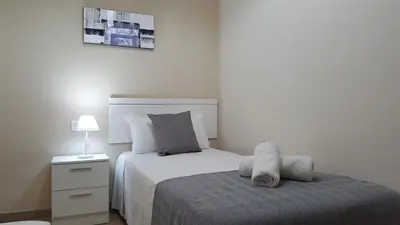 Cama o camas de una habitación en Eduardo Lucena 5, Flamenco