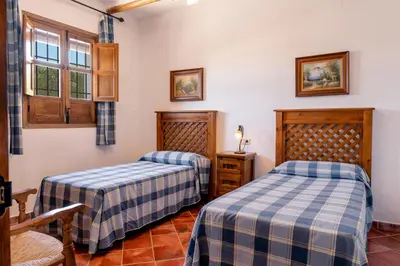Cama o camas de una habitación en Cortijo La Presa