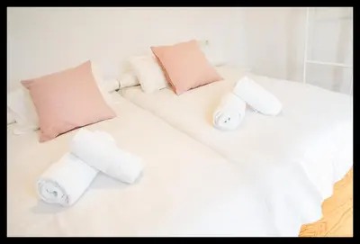 Cama o camas de una habitación en La Peluquería