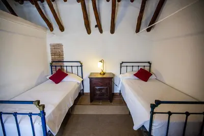 Cama o camas de una habitación en Hotel Cortijo del Marqués