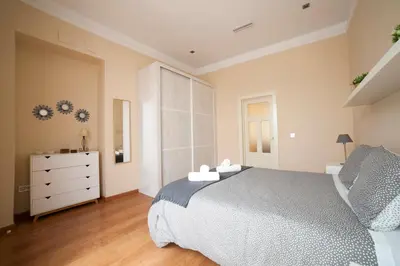Cama o camas de una habitación en Alohamundi Quevedo