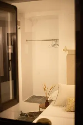Cama o camas de una habitación en HOTEL BOUTIQUE ALMA ANDALUSí