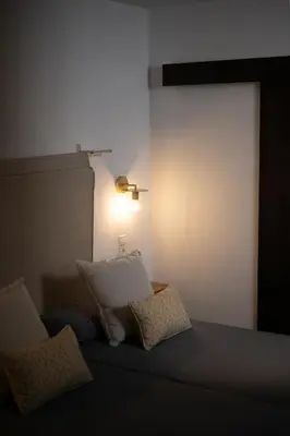 Cama o camas de una habitación en HOTEL BOUTIQUE ALMA ANDALUSí