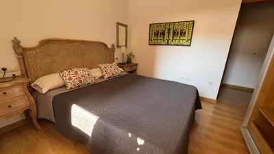 Cama o camas de una habitación en Apartamentos Alcazar de Baeza