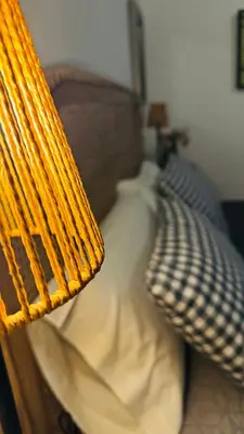 Cama o camas de una habitación en Apartamentos Alcazar de Baeza