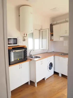 Una cocina o zona de cocina en Apartamento en Judería La Murallita