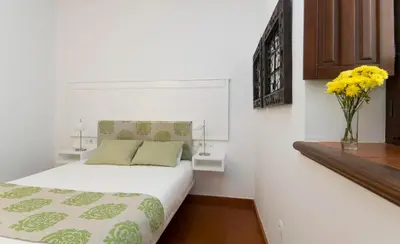 Cama o camas de una habitación en Entre2mezquitas 6