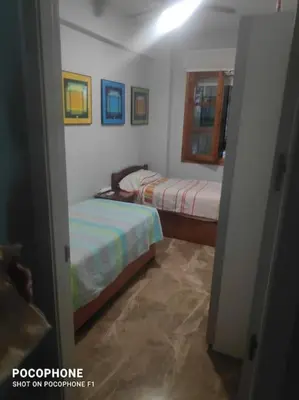 Cama o camas de una habitación en casa de los patios amurallados