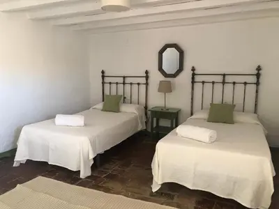 Cama o camas de una habitación en Casa del Almezo