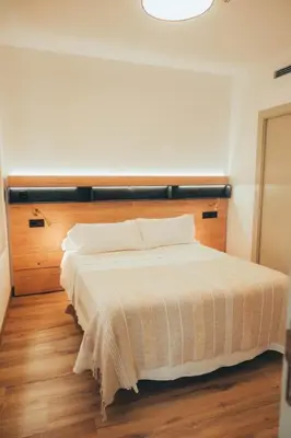 Cama o camas de una habitación en Hostal San Andres