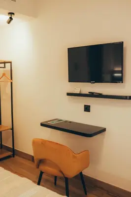 Una televisión o centro de entretenimiento en Hostal San Andres