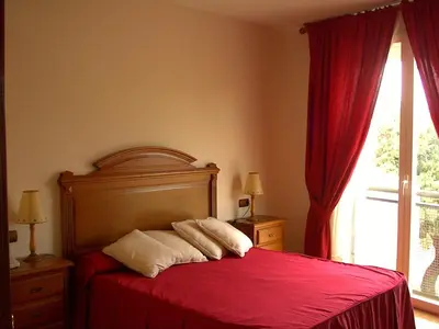 Cama o camas de una habitación en Hotel Paraje La Lambra