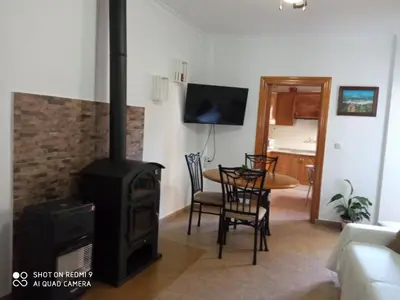 Una televisión o centro de entretenimiento en Apartamentos Virgen de Villaverde