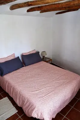 Cama o camas de una habitación en Casa del Arrabal