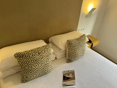 Cama o camas de una habitación en Hotel RL Anibal
