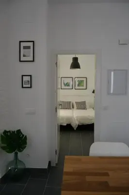 Cama o camas de una habitación en Tu Patio en Sevilla