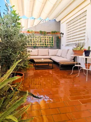 Un balcón o terraza de Encantador Ático con Terraza