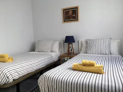 Cama o camas de una habitación en Encantador Ático con Terraza