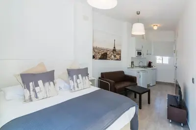 Una cocina o zona de cocina en Apartamentos Tendillas