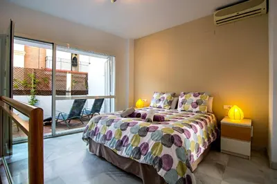 Cama o camas de una habitación en DescubreHome Sol Town Center Private Terrace