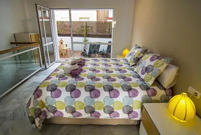 Cama o camas de una habitación en DescubreHome Sol Town Center Private Terrace
