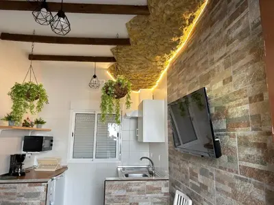 Una cocina o zona de cocina en Casa entre Rocas Setenil