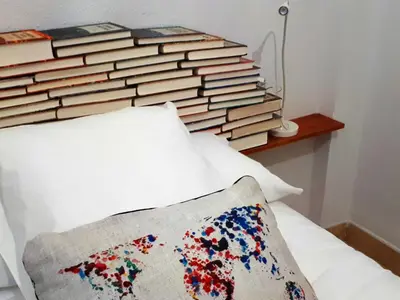 Cama o camas de una habitación en La Librería de Viana