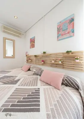 Cama o camas de una habitación en Apartamento Polvora, junto al Puente Romano