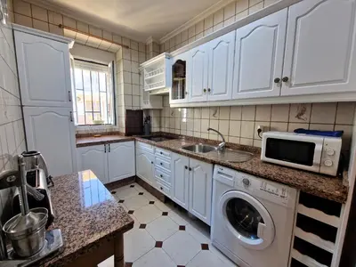 Una cocina o zona de cocina en Apartamento Polvora, junto al Puente Romano