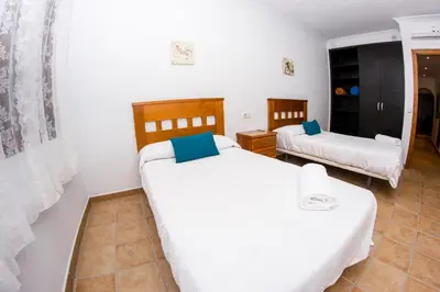 Cama o camas de una habitación en Apartamento Los Arcos