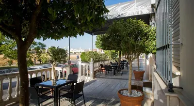 Un balcón o terraza de Hotel Mairena