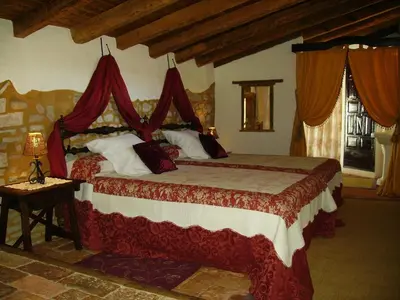 Cama o camas de una habitación en Hotel Boutique Condes Fúcares