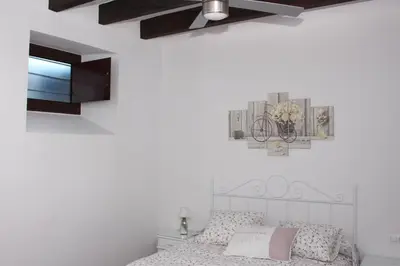 Cama o camas de una habitación en El Capricho de San Fernando, Consigna gratis y Parking a 200mts
