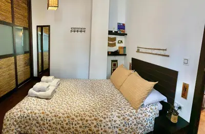 Cama o camas de una habitación en Atico Deluxe San Basilio