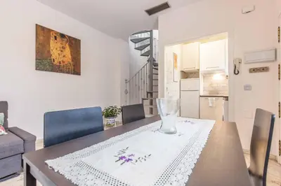 Una cocina o zona de cocina en Maravilloso dúplex en Sevilla Escoberos