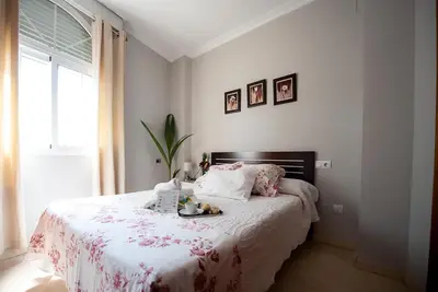 Cama o camas de una habitación en Hostal La Muralla