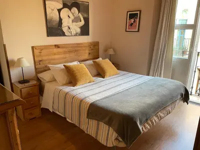 Cama o camas de una habitación en VIVIENDA SAN AGUSTÍN