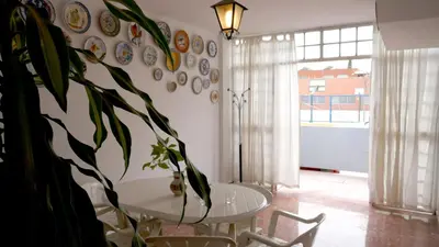 Zona de estar de Casa Soleada Calle Tranquila Junto a FIBES