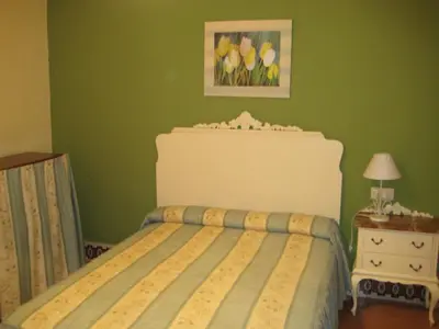 Cama o camas de una habitación en Pensión Bienvenido